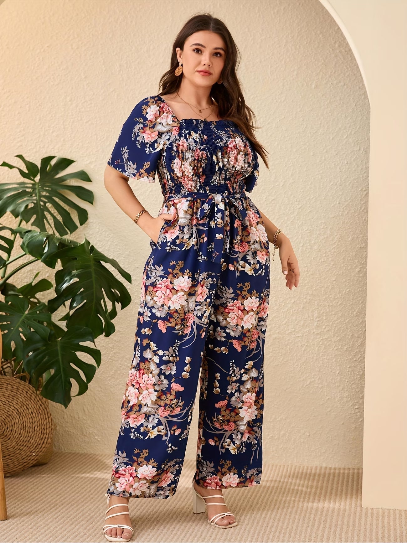 CurveBloom Plus Size Floral Wide-Leg Jumpsuit with Tie Belt